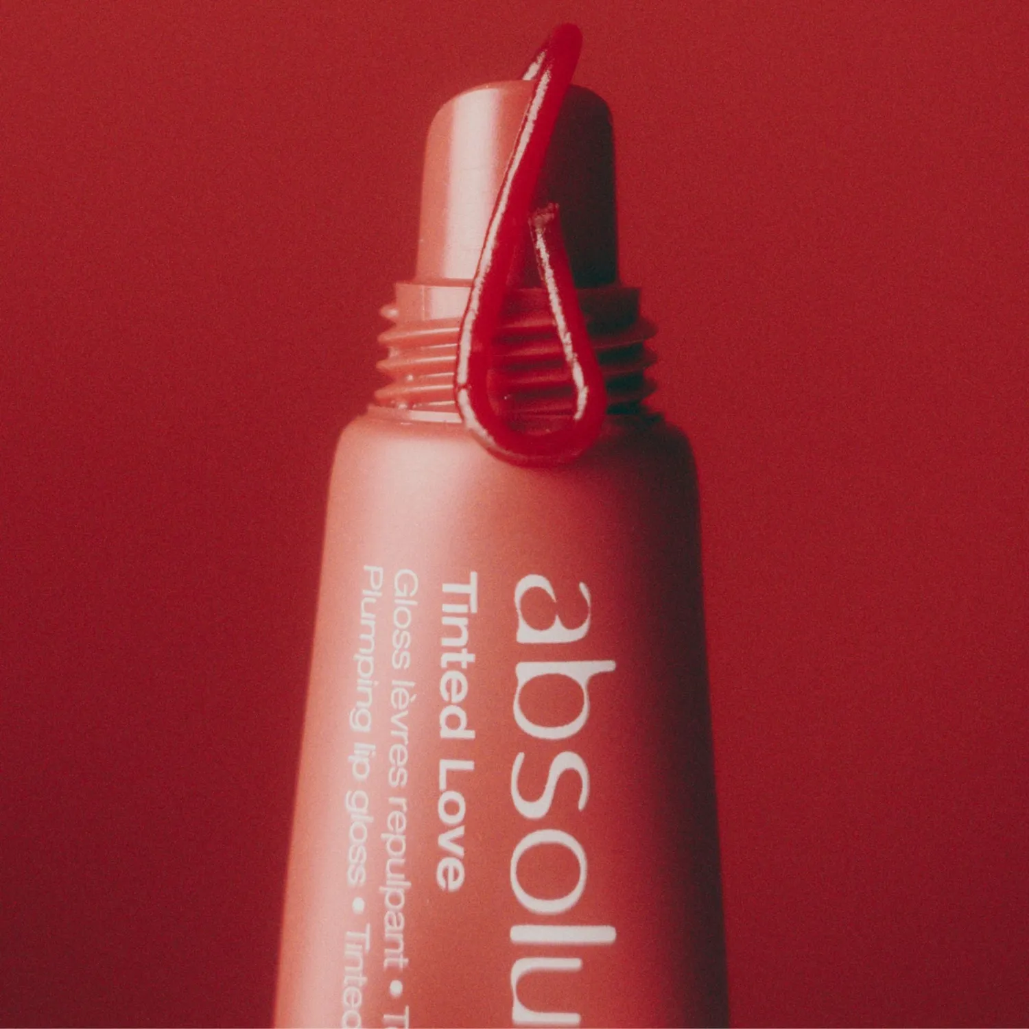 Absolution Tinted Love läppglans rosé plumpande