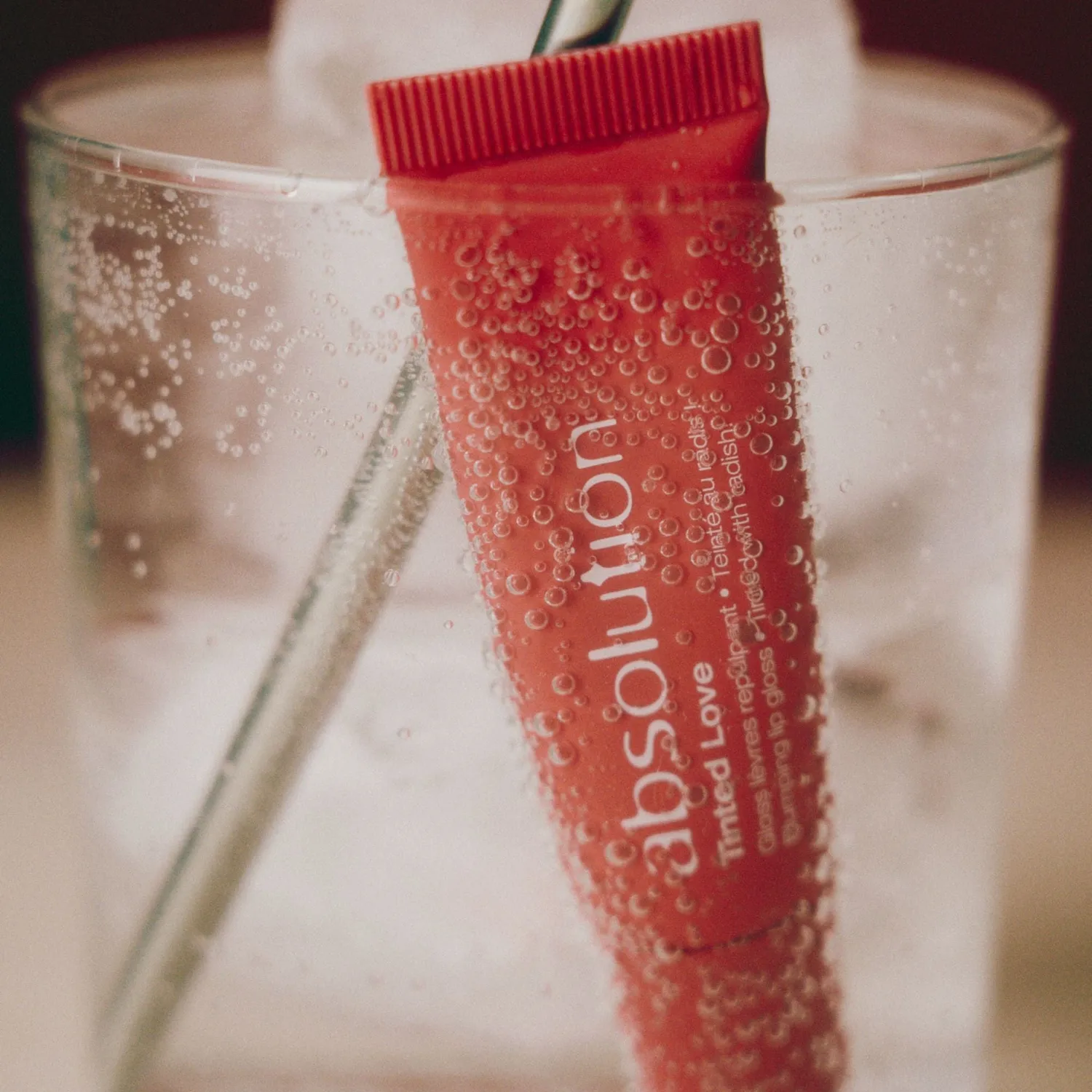 Absolution Tinted Love läppglans rosé plumpande